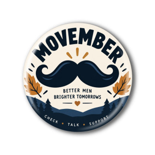 Placka Movember na krémovém podkladu s tmavě modrým knírem, zlatavými listy, srdcem a krajinou s jehličnany